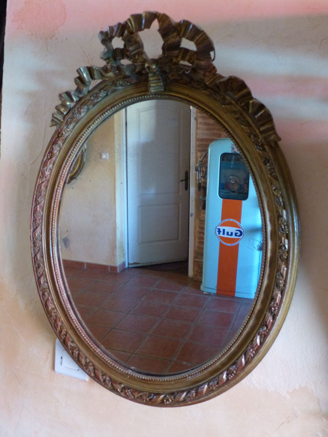 Miroir ovale stuc doré style Louis XVI