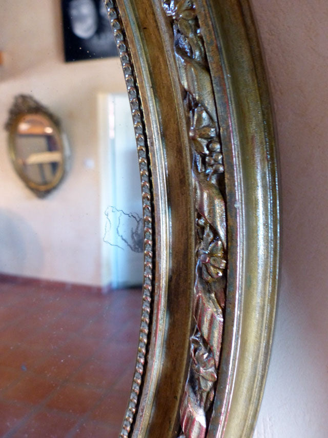 Miroir ovale stuc doré style Louis XVI