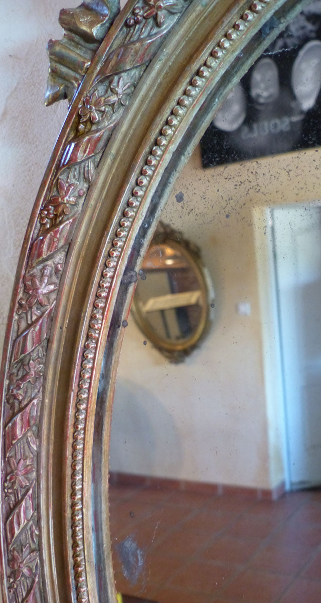 Miroir ovale stuc doré style Louis XVI