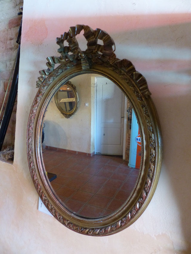 Miroir ovale stuc doré style Louis XVI